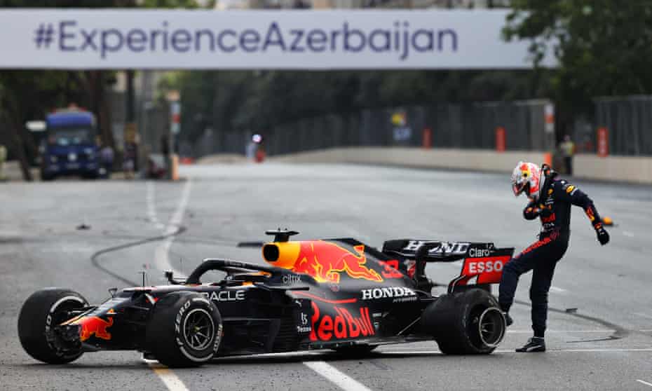 Max Verstappen kicks his tyre after crashing out of the Azerbaijan Grand Prix